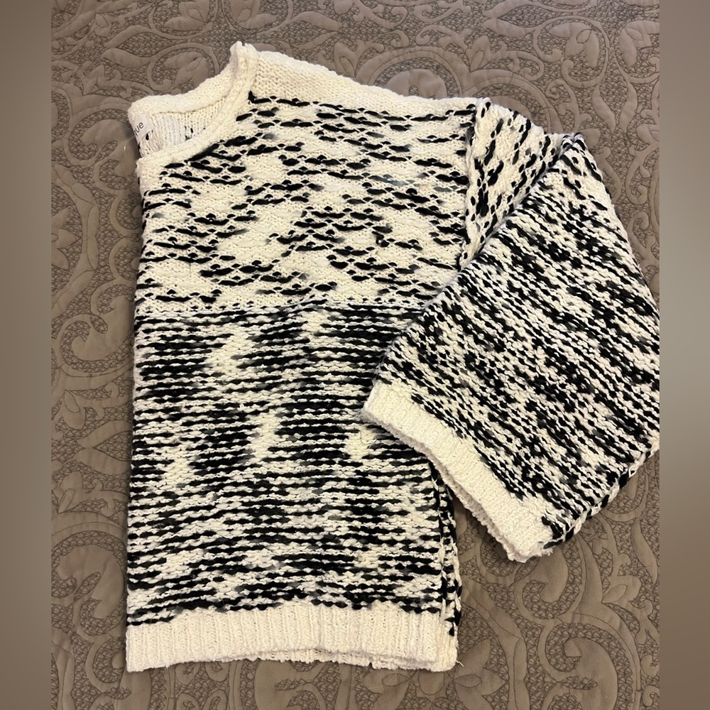 Vestique sweater